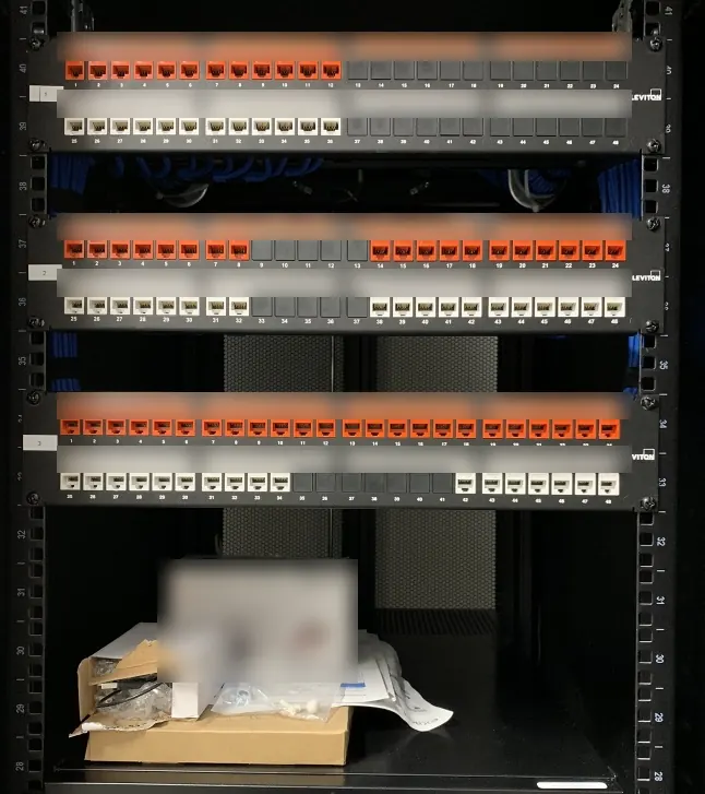 Structured cabling patch panels and telecom rack at the City of Sunrise Civic Center, installed by Martec Technologies
