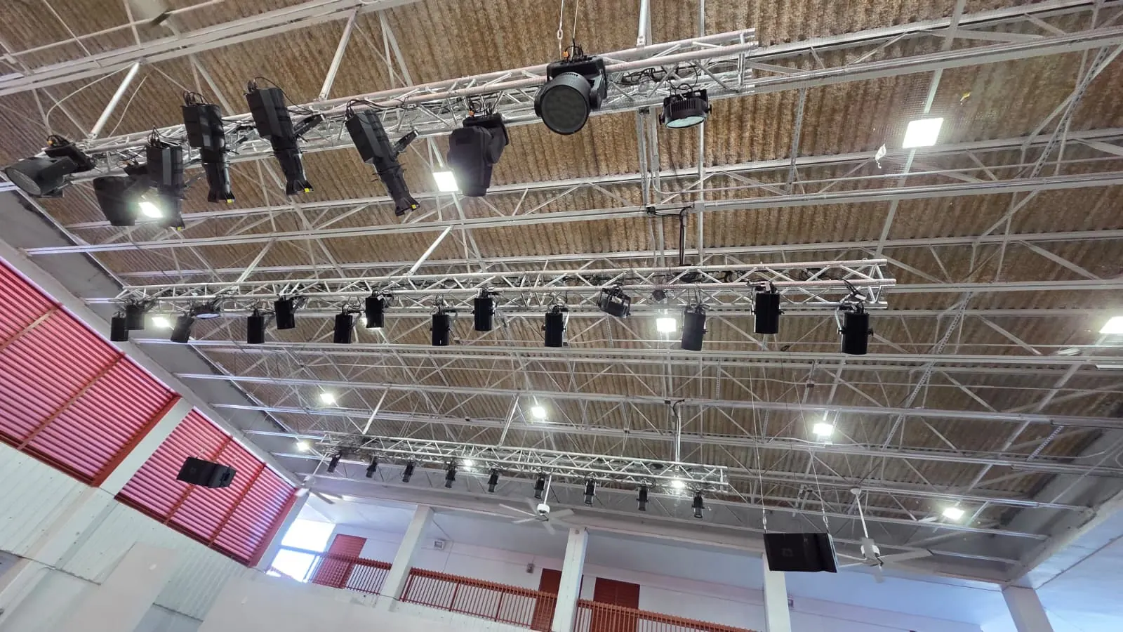 Truss-mounted theatrical LED stage lighting installed by Martec Technologies at Winston Park K-8 Center, Miami